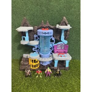 Fisher-Price Imaginext DC Super Friends Batcave Playset with 4 Figures Batman